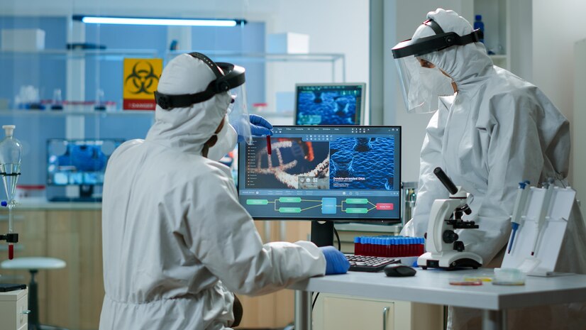 scientists-protection-suits-analysing-test-tubes-with-blood-sample-chemical-equipped-laboratory-biologists-examining-vaccine-evolution-using-high-tech-technology-researching-treatment_482257-13003